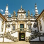 Explore the ornate Baroque facade of the historic Mateus Palace in Vila Real, Portugal.